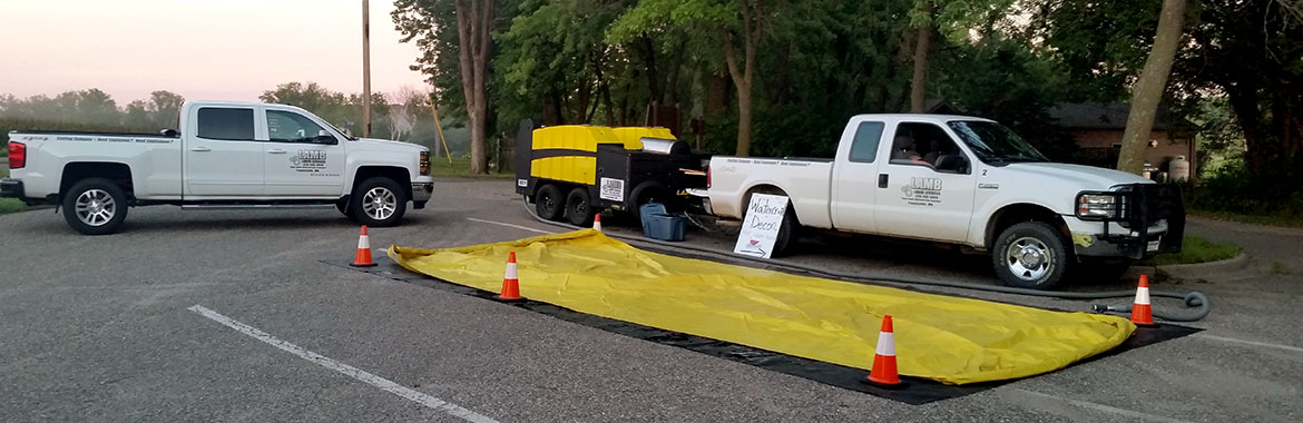 LAMB Labor Services' LANDA mobile wash and reclaim station setup at a boat landing