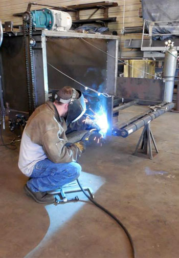 Former job seeker now working in a welding shop with assistance from LAMB Labor Services